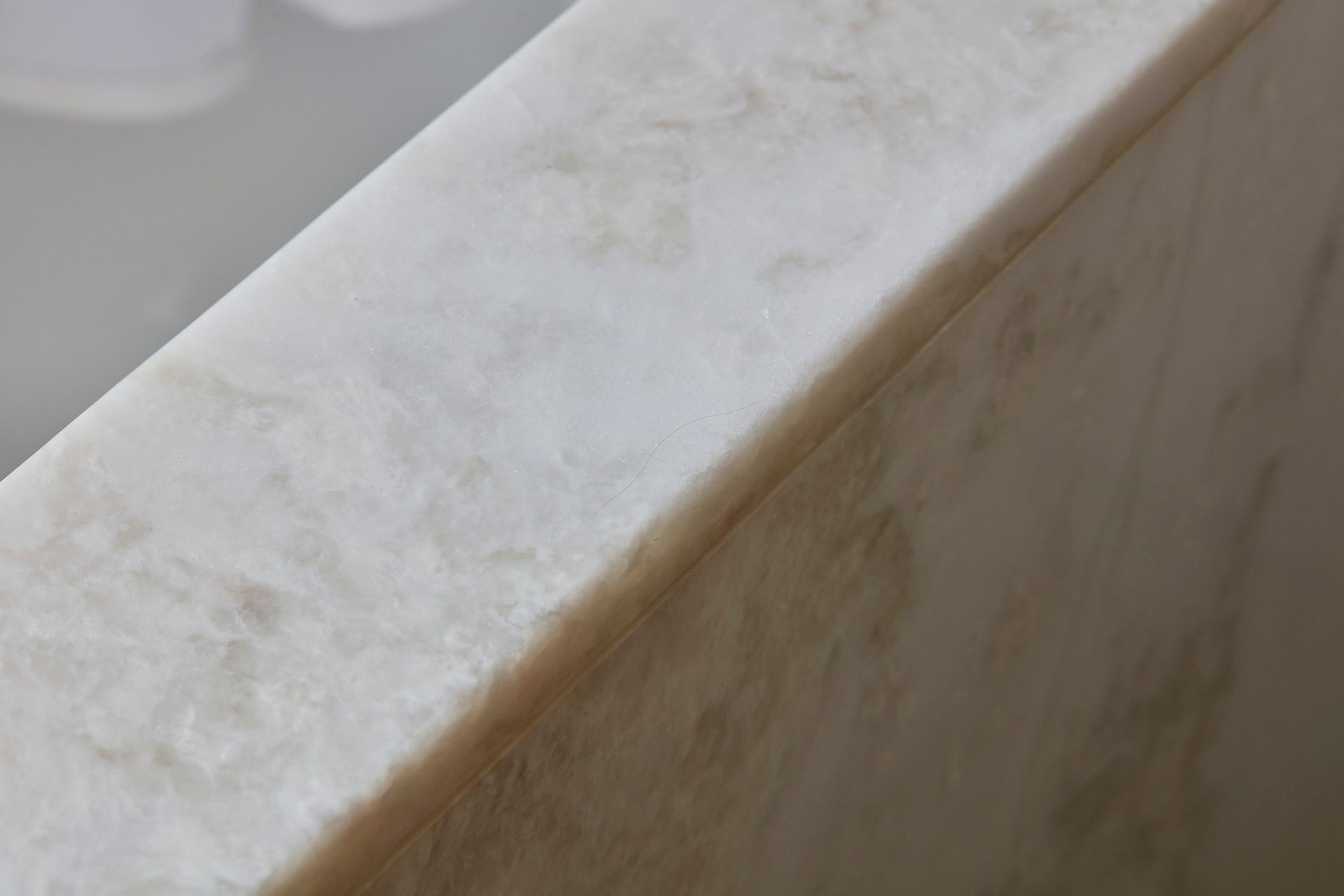 Details of the white Carrara marble installed in the bathroom